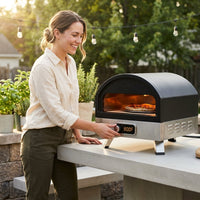 12 In. Propane Pizza Oven, Outdoor Pizza Oven in Black with Rotating Pizza Stone, Glove and Pizza Cutter — Lifestyle